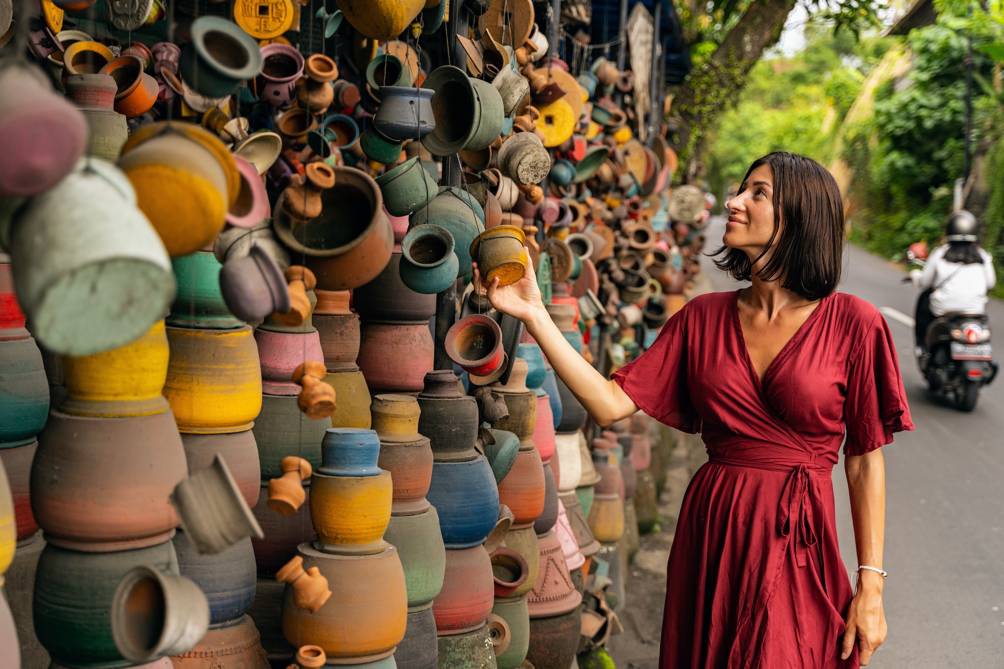 cheerful-young-woman-walking-on-local-market.jpg